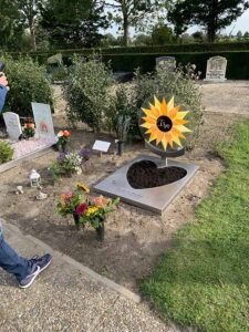 babygraf met zon en hart