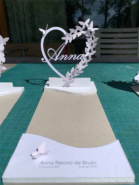 ontwerp gedenkteken open hart met vlinders